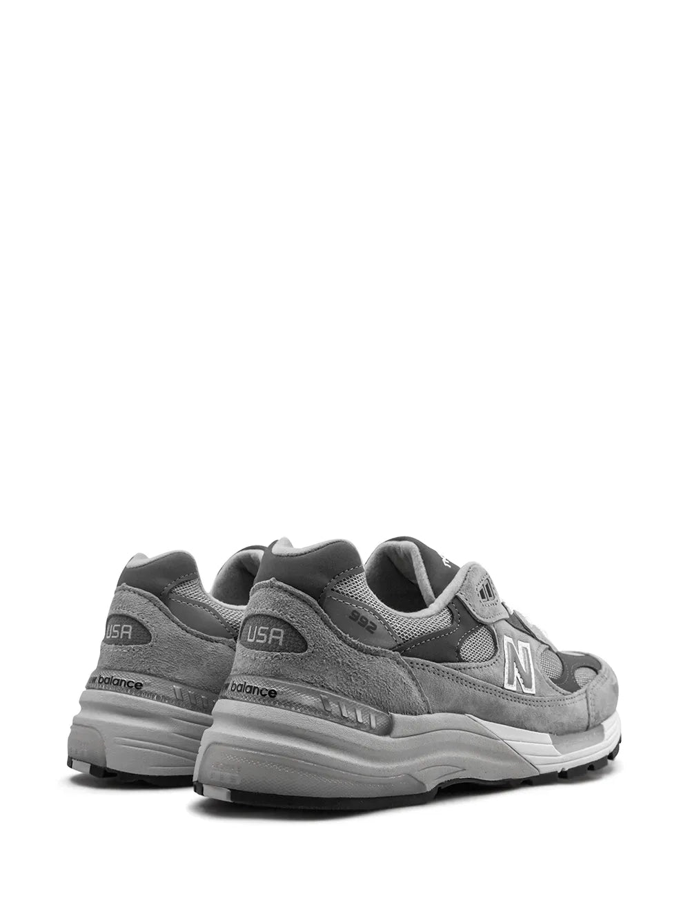 Gray athletic sneaker rear view with cushioned heel and 'N' logo details