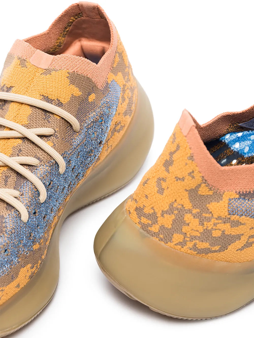 adidas Yeezy Boost 380 sneakers close-up, orange camo knit with blue sections