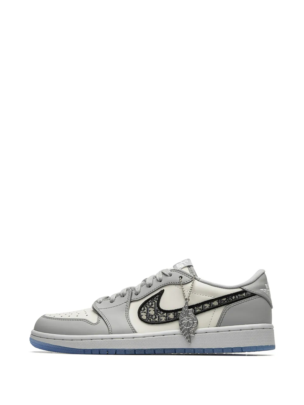 White and gray low-top sneakers with black logo stripe and winged emblem