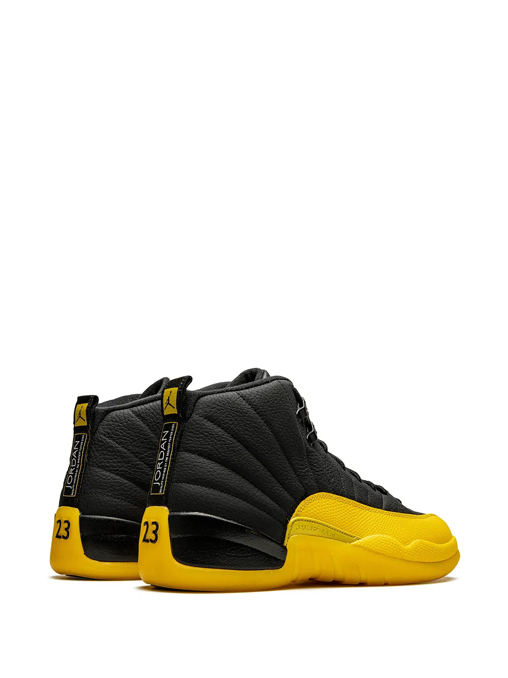 Air Jordan 12 Retro sneaker, black quilted upper with yellow heel tab and midsole