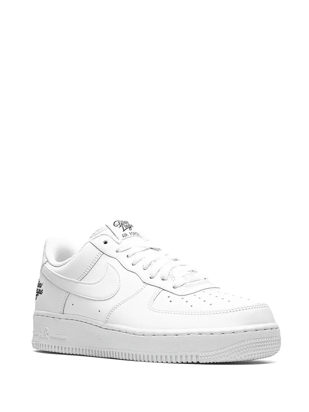 White low-top sneakers with front lace eyelets and circular Drew League logo