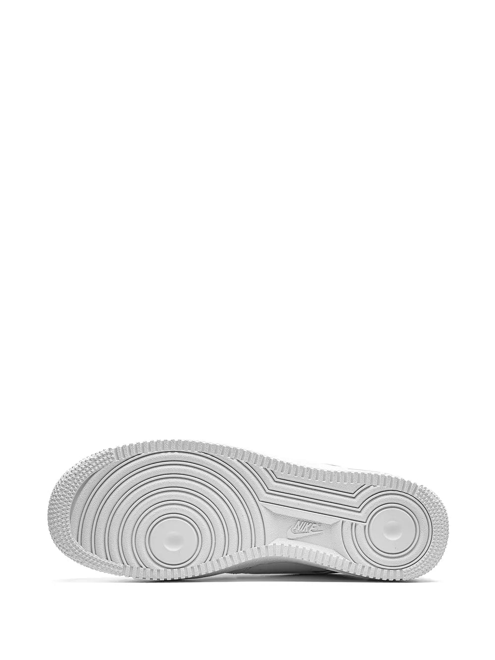 White sneaker outsole with patterned traction grooves and Air branding