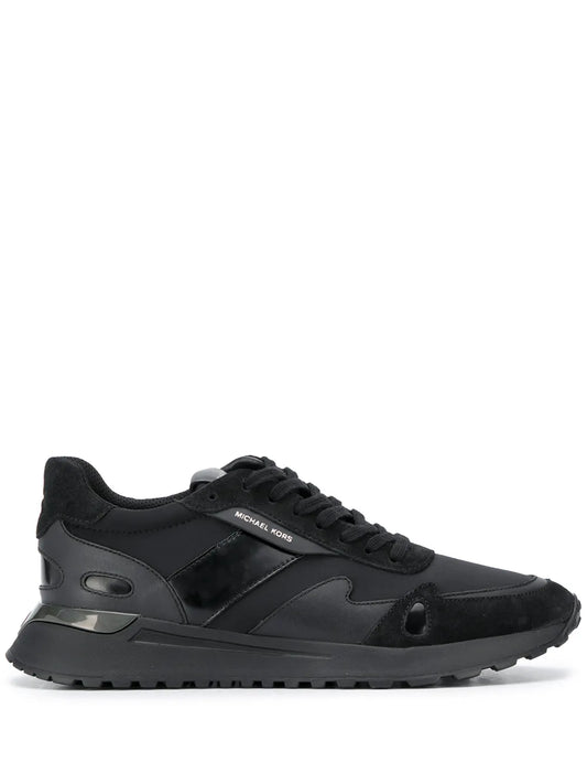Black low-top lace-up sneakers with panelled overlays and rubber sole