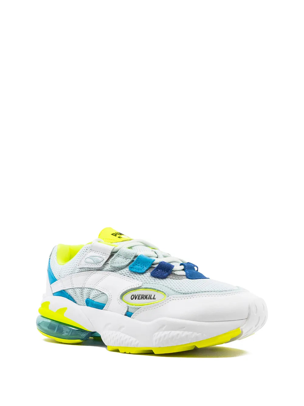 White low-top sneakers with turquoise straps and neon yellow outsoles