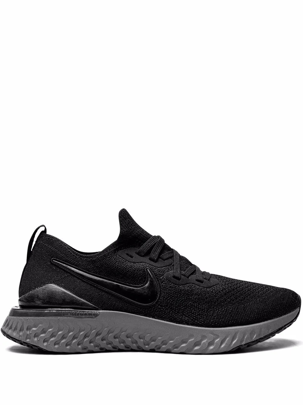 Black knit running shoe with swoosh logo and chunky foam midsole