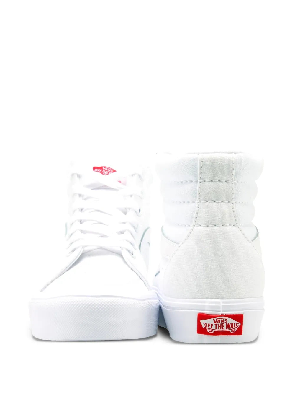 Pair of white high-top skate sneakers with Vans heel label and lace-up