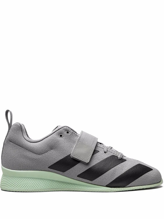 Light gray weightlifting shoes with dark straps, hook-and-loop ankle strap, mint sole