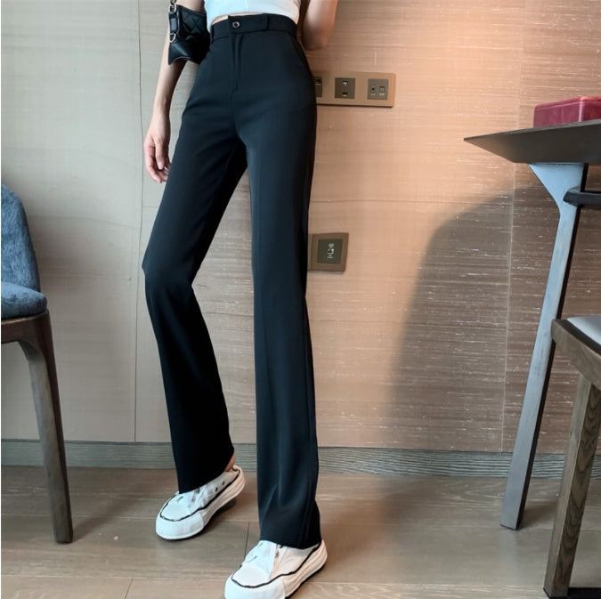 Women’s wide-leg pants in deep black, elastic waist and straight flared legs