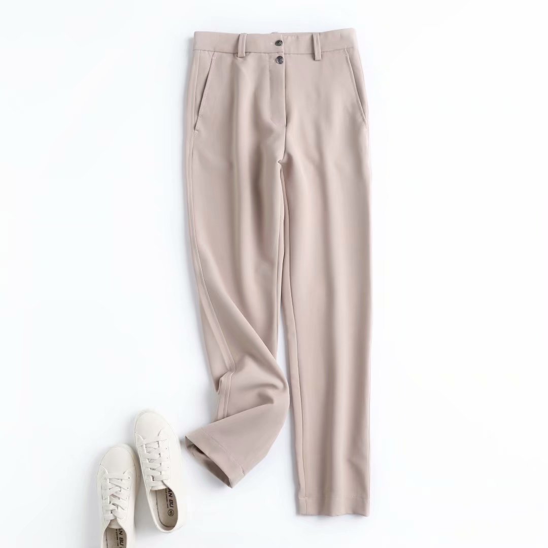Apricot straight casual trousers with two-button front, belt loops, and side pockets