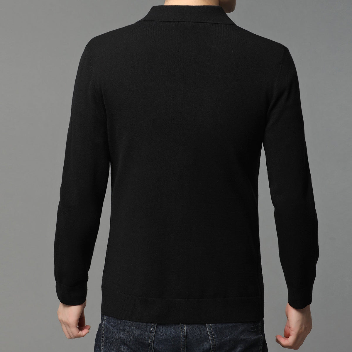 Mens black blazer back view with stand collar and long sleeves, worn over white tee