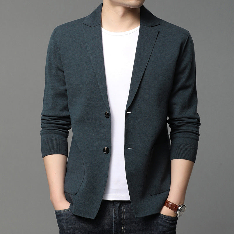 Mens dark teal blazer with notched lapels and two-button front, front pockets, over white tee