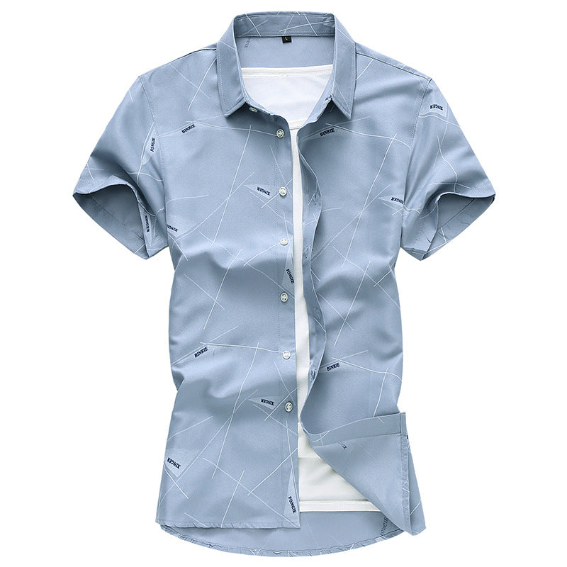 Men's dress shirt in powder blue with geometric line pattern and button front