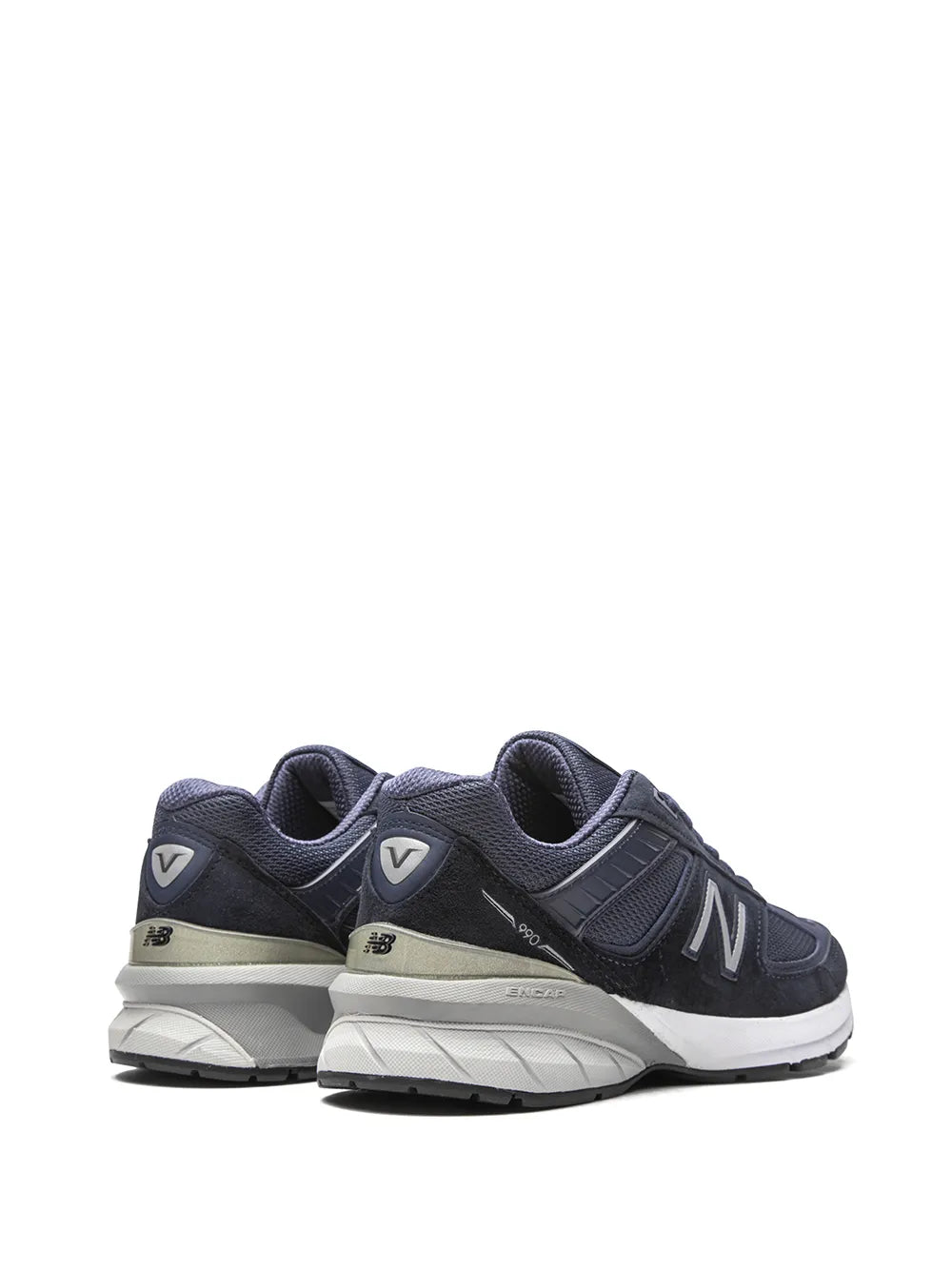 Navy New Balance M990 sneakers with two-tone heel and padded collars