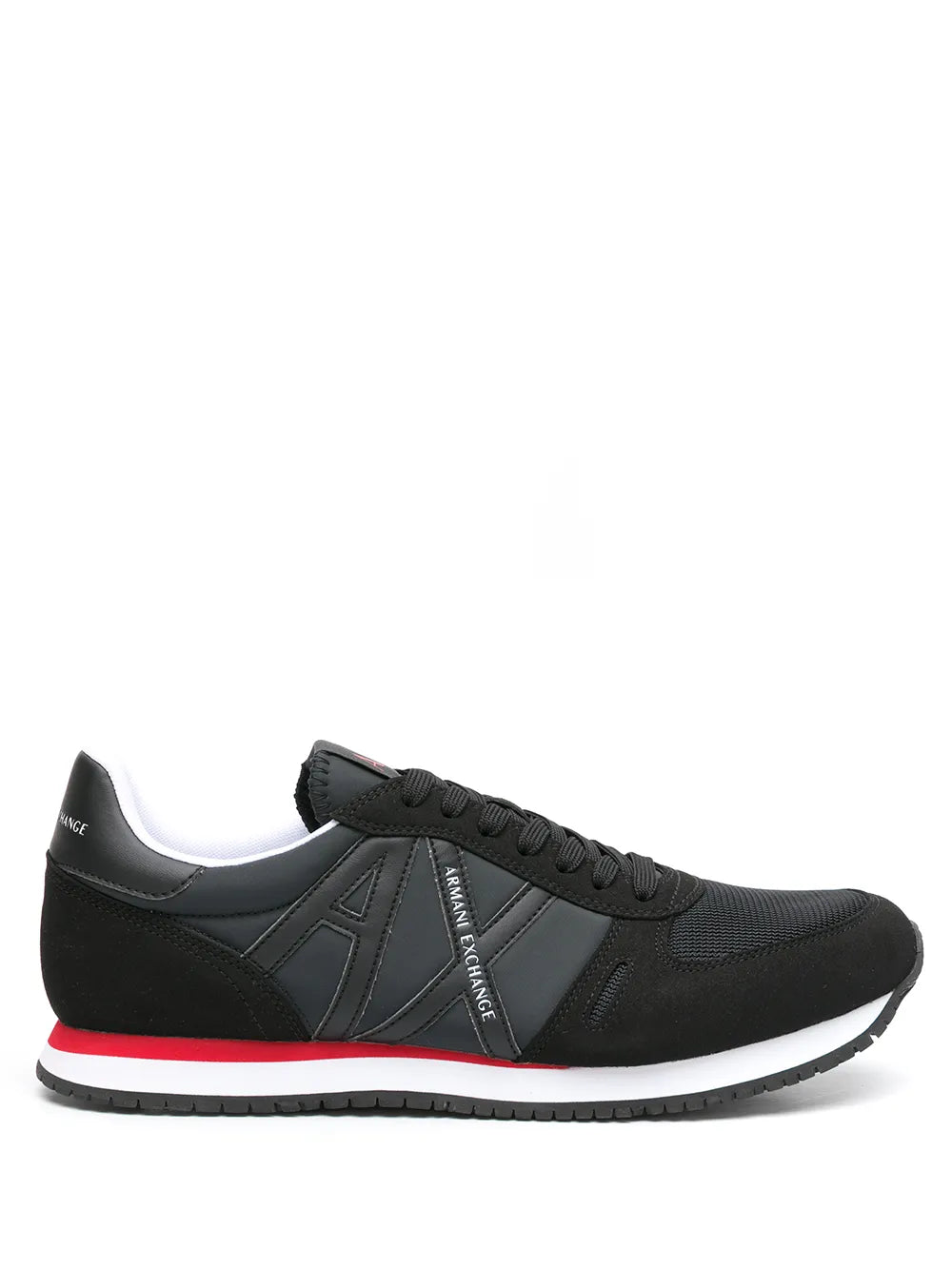 Black low-top sneakers with logo patch, red/white midsole stripe