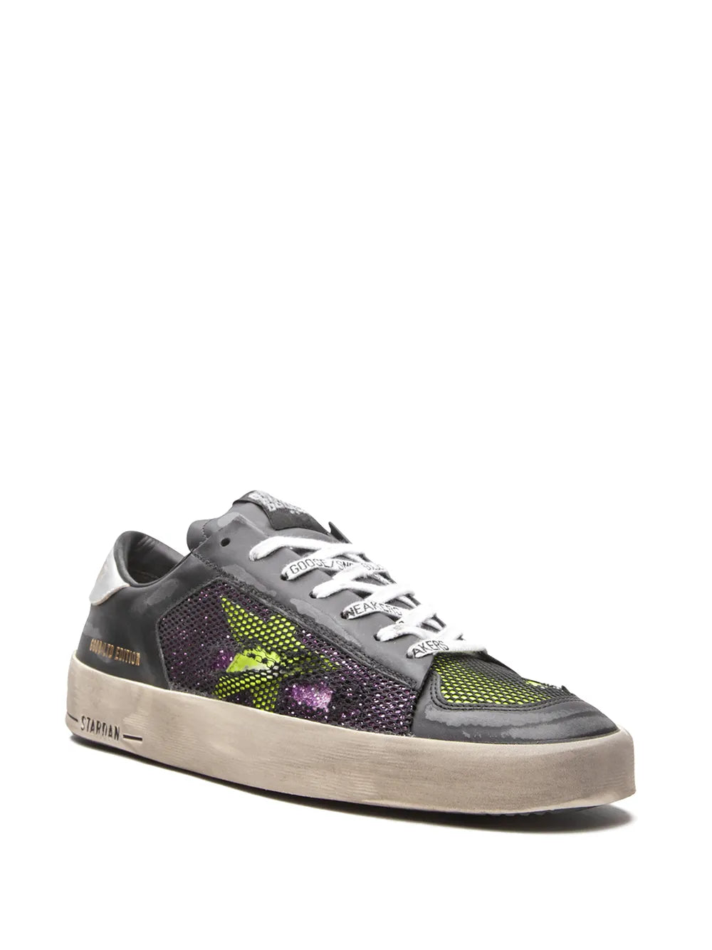 Black low-top sneakers with multicolor glitter upper, white laces, beige rubber sole