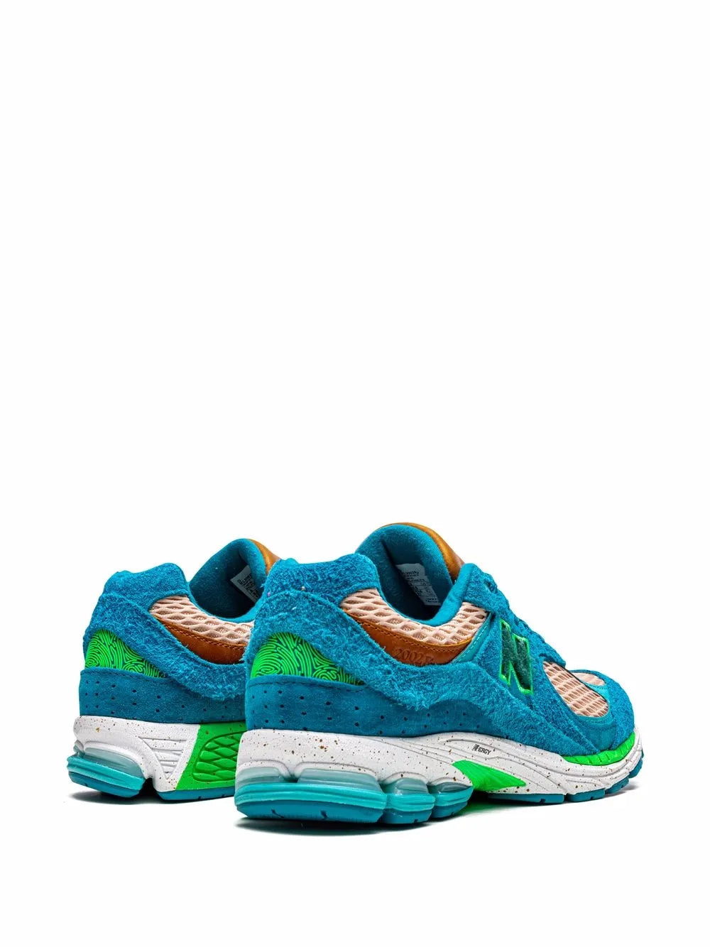 Turquoise low-top sneakers with green midsole accent and tan mesh inserts
