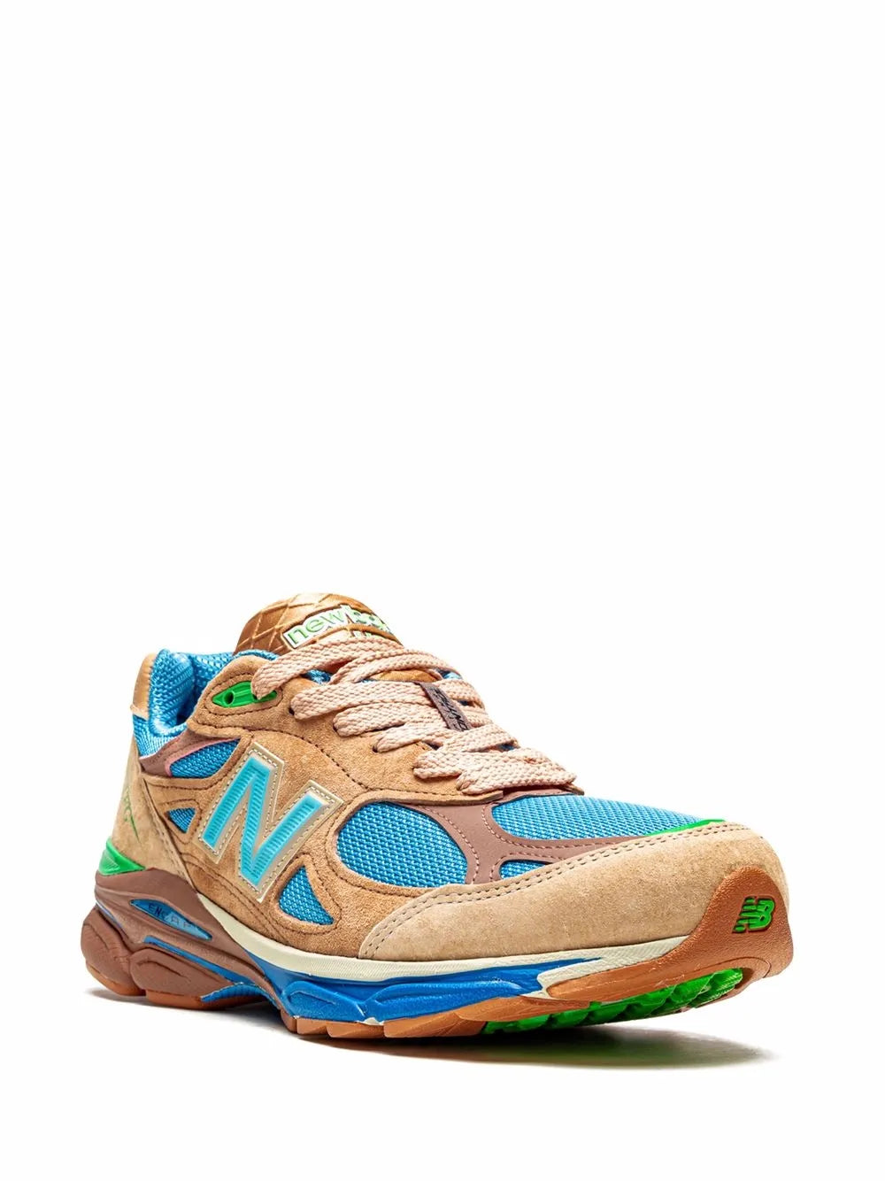 Beige and blue New Balance 990V3 sneakers with green details and textured uppers