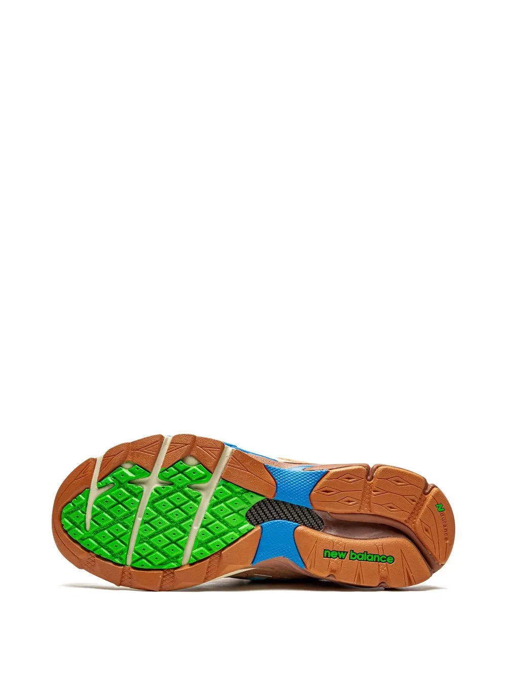 New Balance 990V3 sneaker outsole with green tread pattern and dark heel