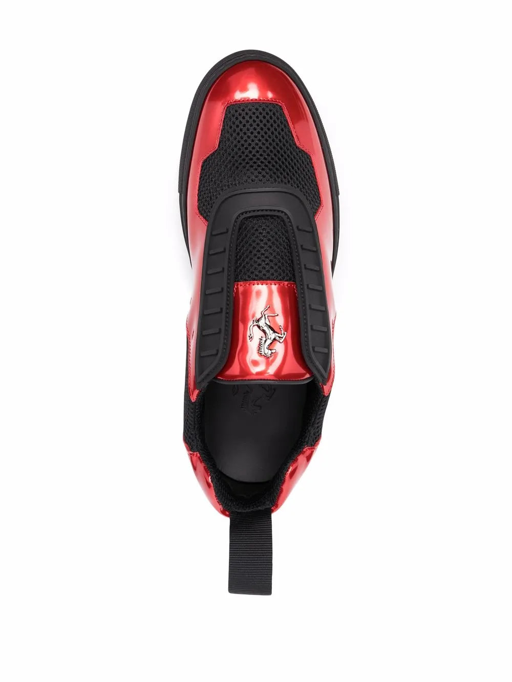 Ferrari sneakers heel view with red lining, black interior, and shield emblem