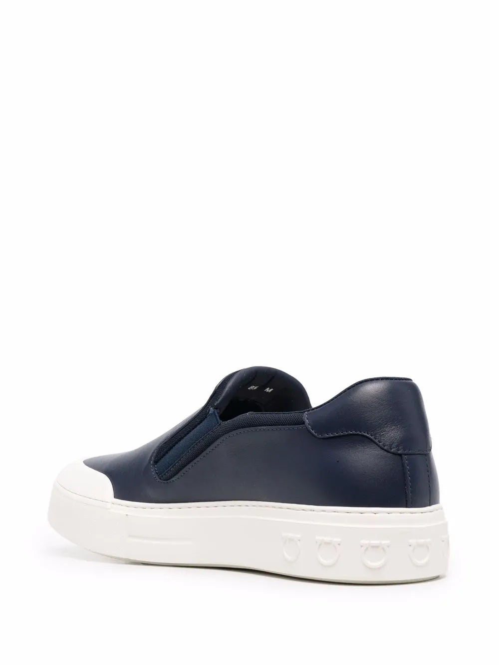 Navy slip-on sneakers with heel tab and branded detail on white sole