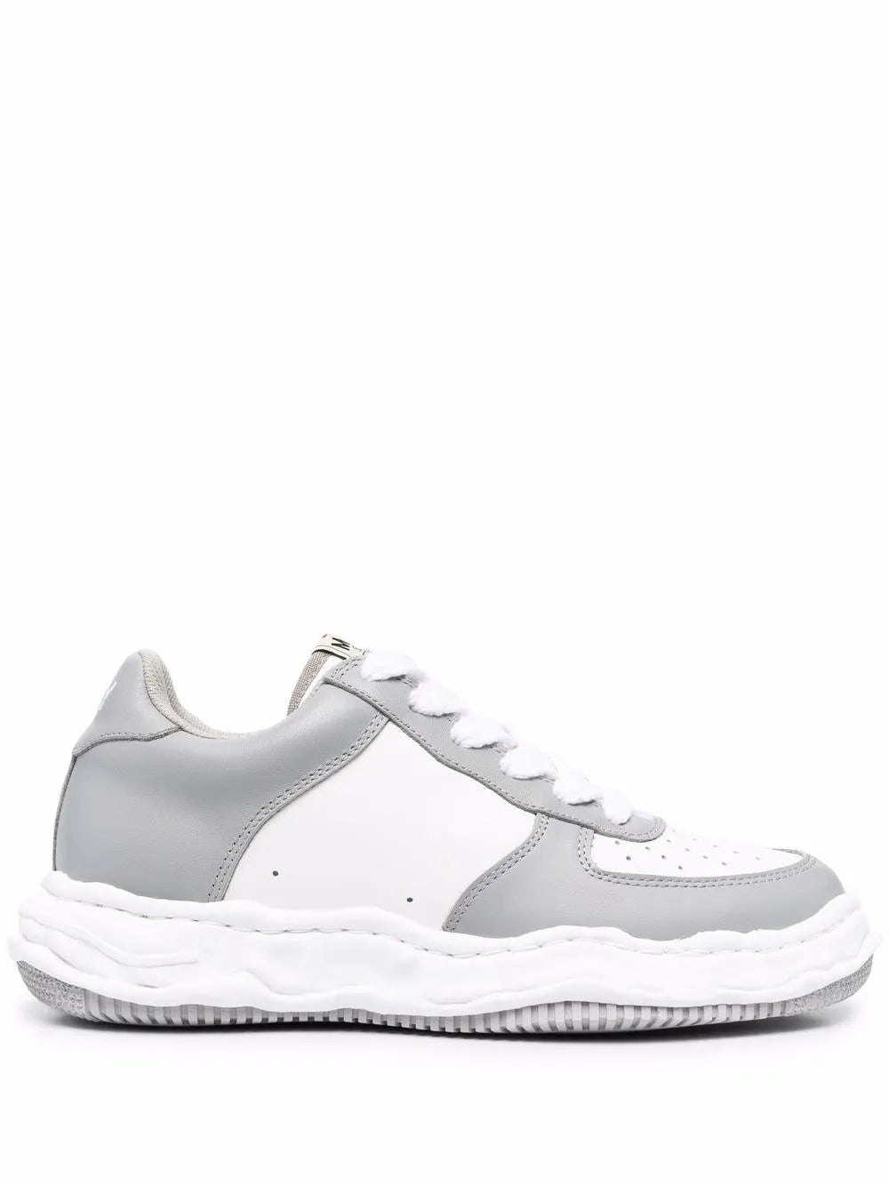 White and light gray chunky sneakers with lace-up front and textured rubber sole