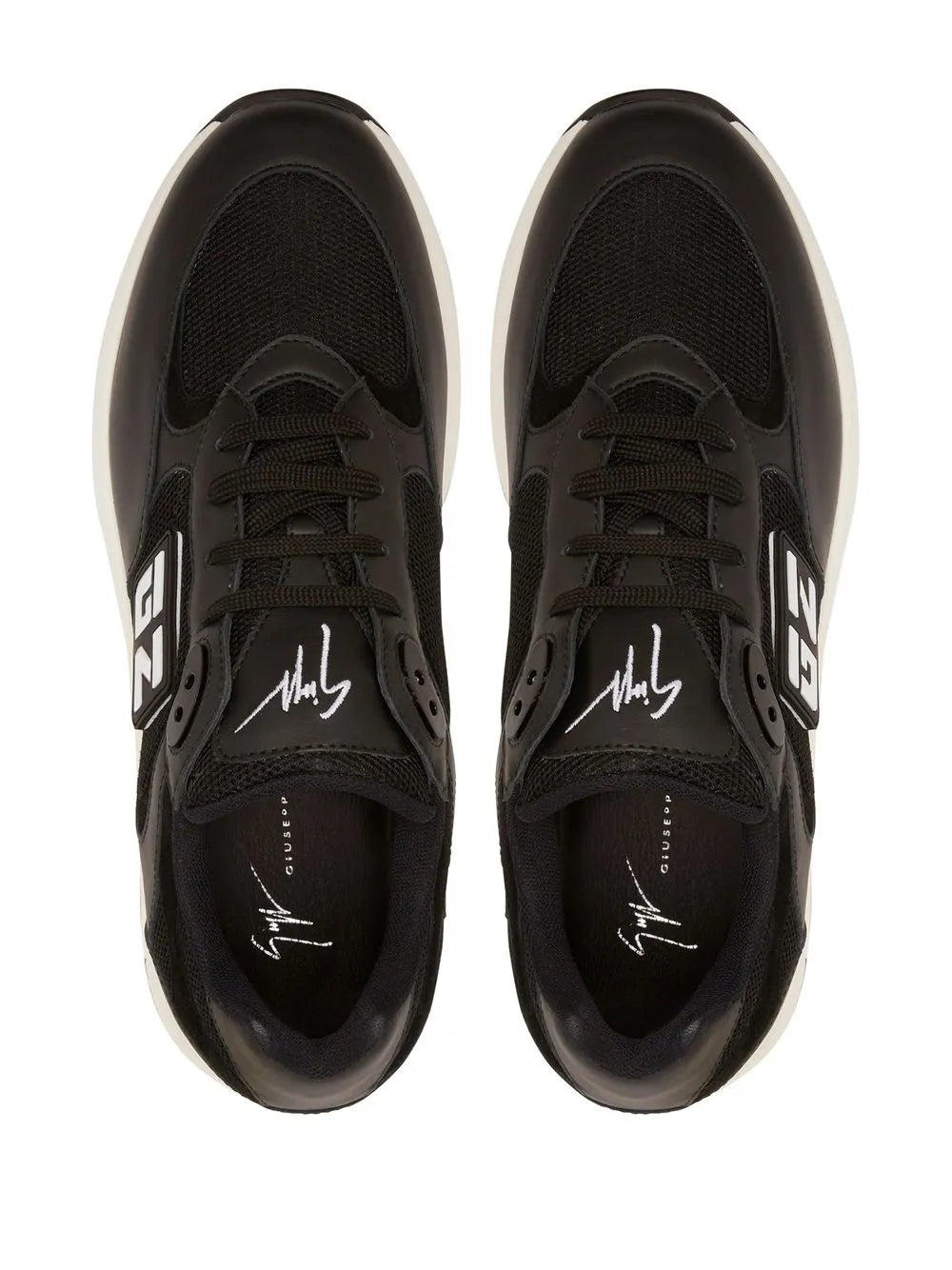 Black low-top sneakers, top view with lace-up closure, GZ logo and signature detail