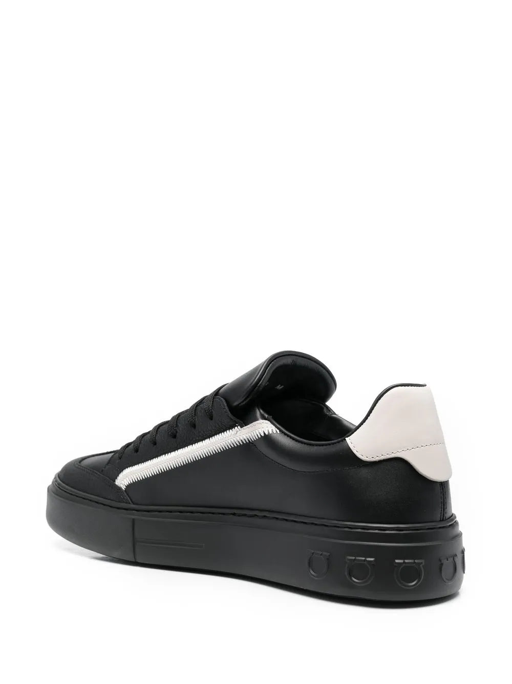 Black lace-up sneakers with white Gancini stripe and cream heel tab, padded collar