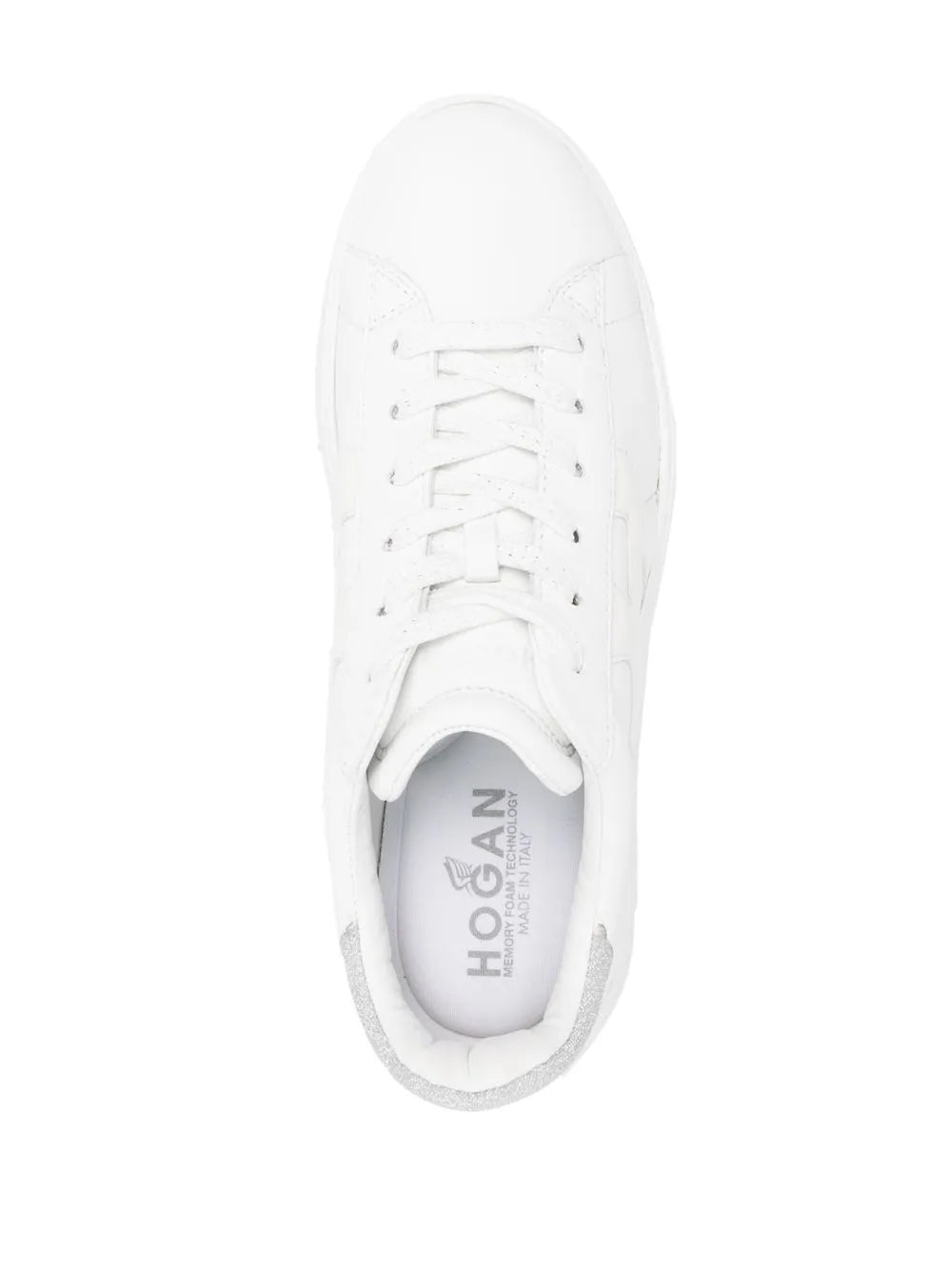 White low-top sneaker tongue and laces with cushioned collar