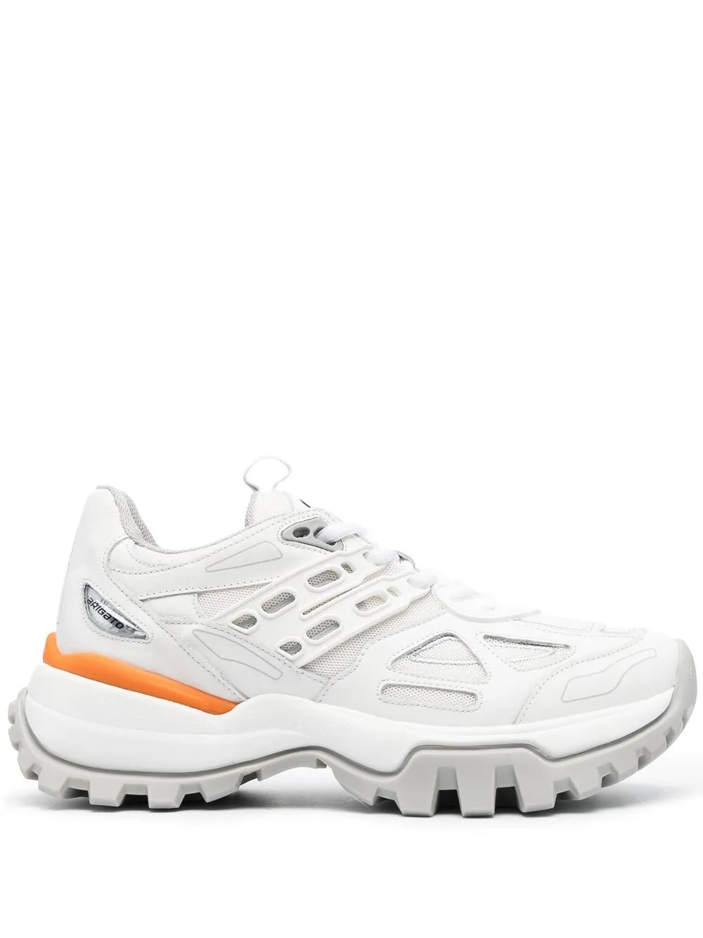 White low-top lace-up sneakers with orange accent and chunky tread sole