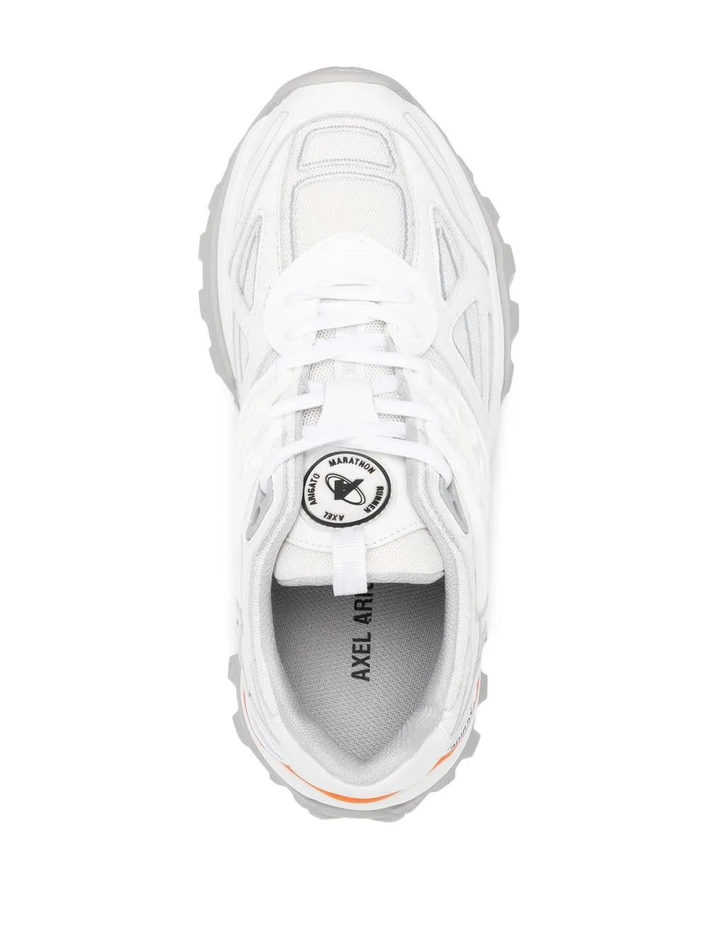 White low-top sneakers with branded tongue label, orange-trimmed collar, lace-up
