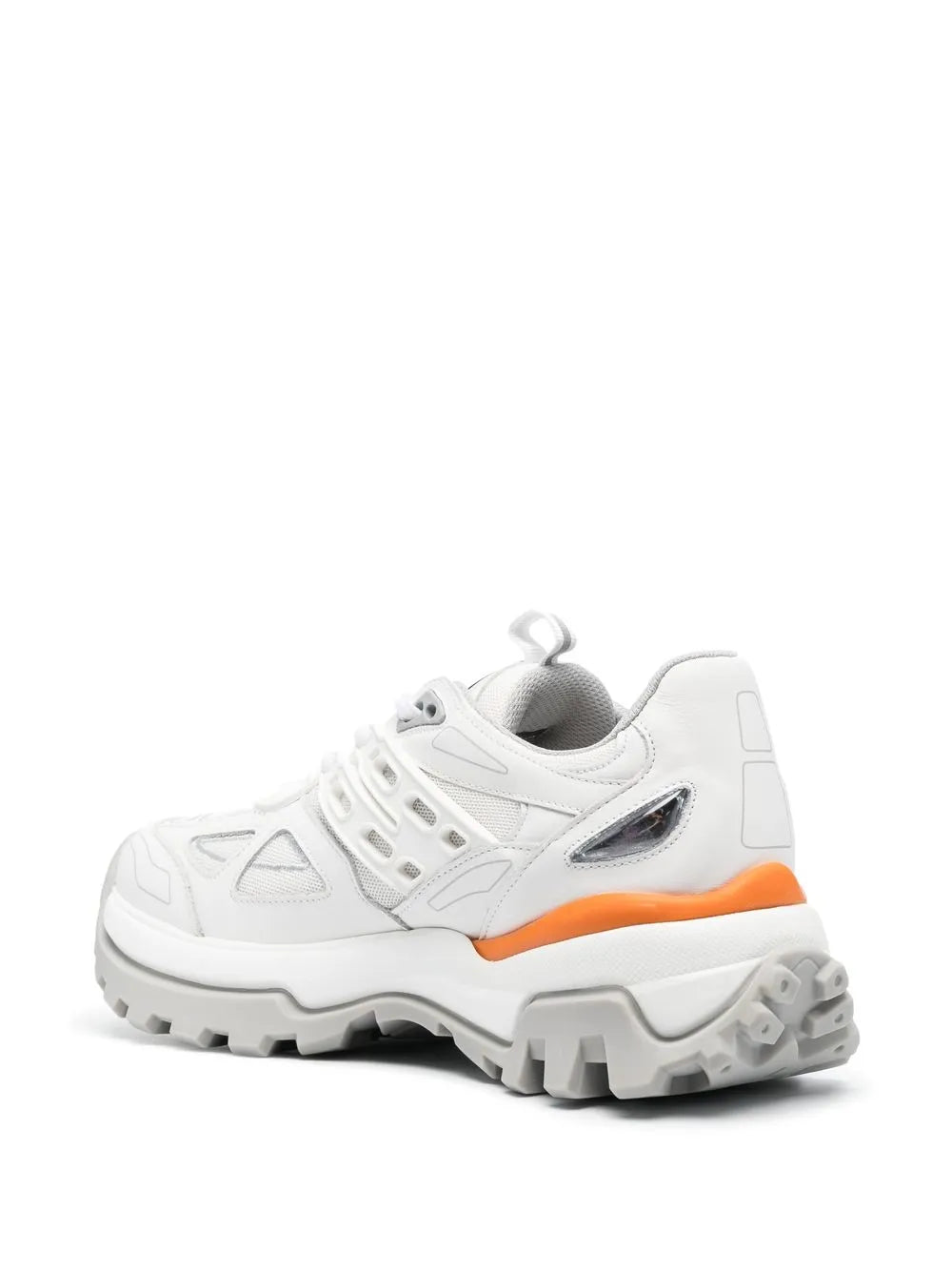 White low-top sneakers with heel detail, orange edge trim, and grippy sole