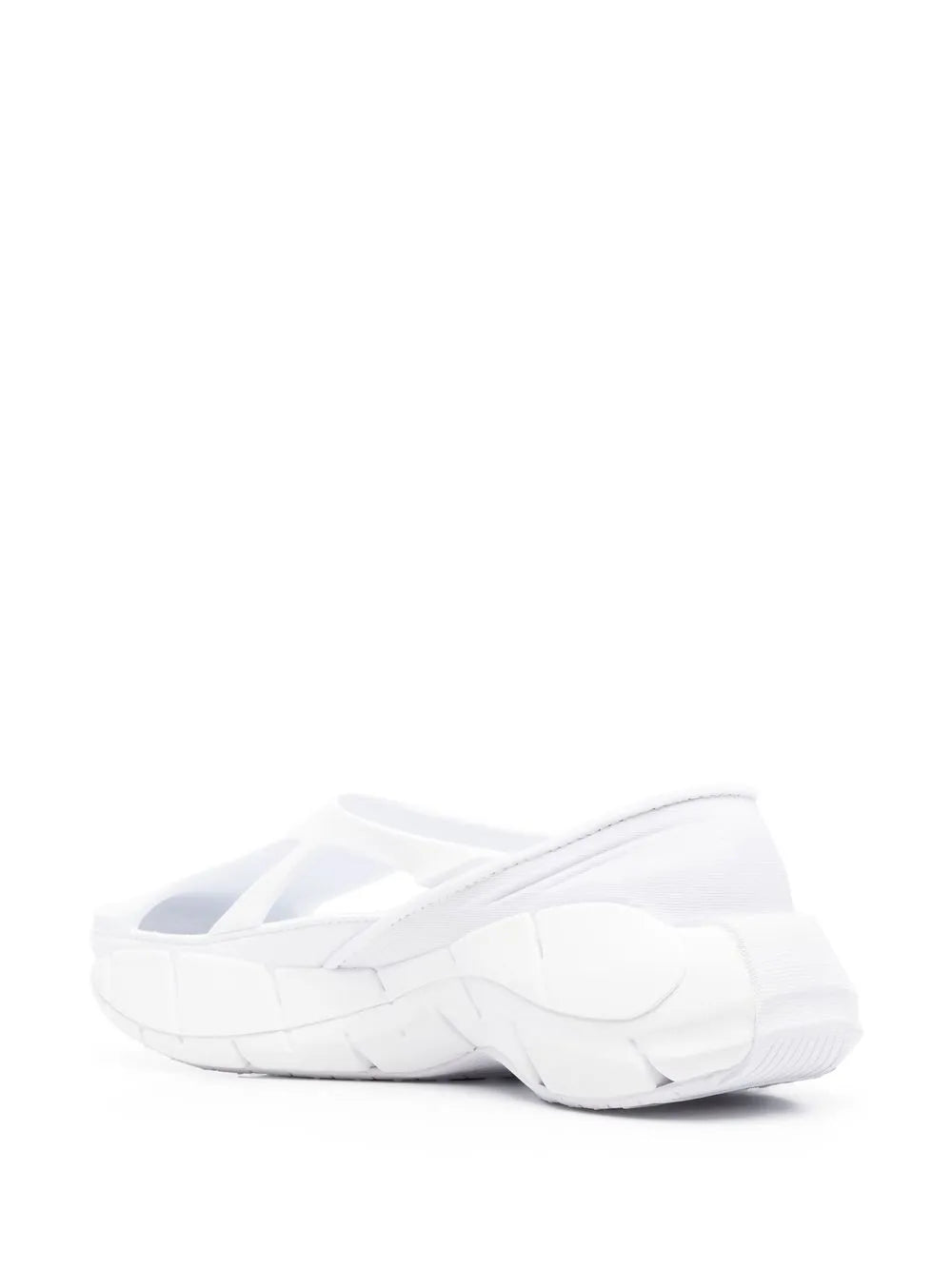 White Maison Margiela sneakers, side profile, cut-out ridged straps and sculpted sole