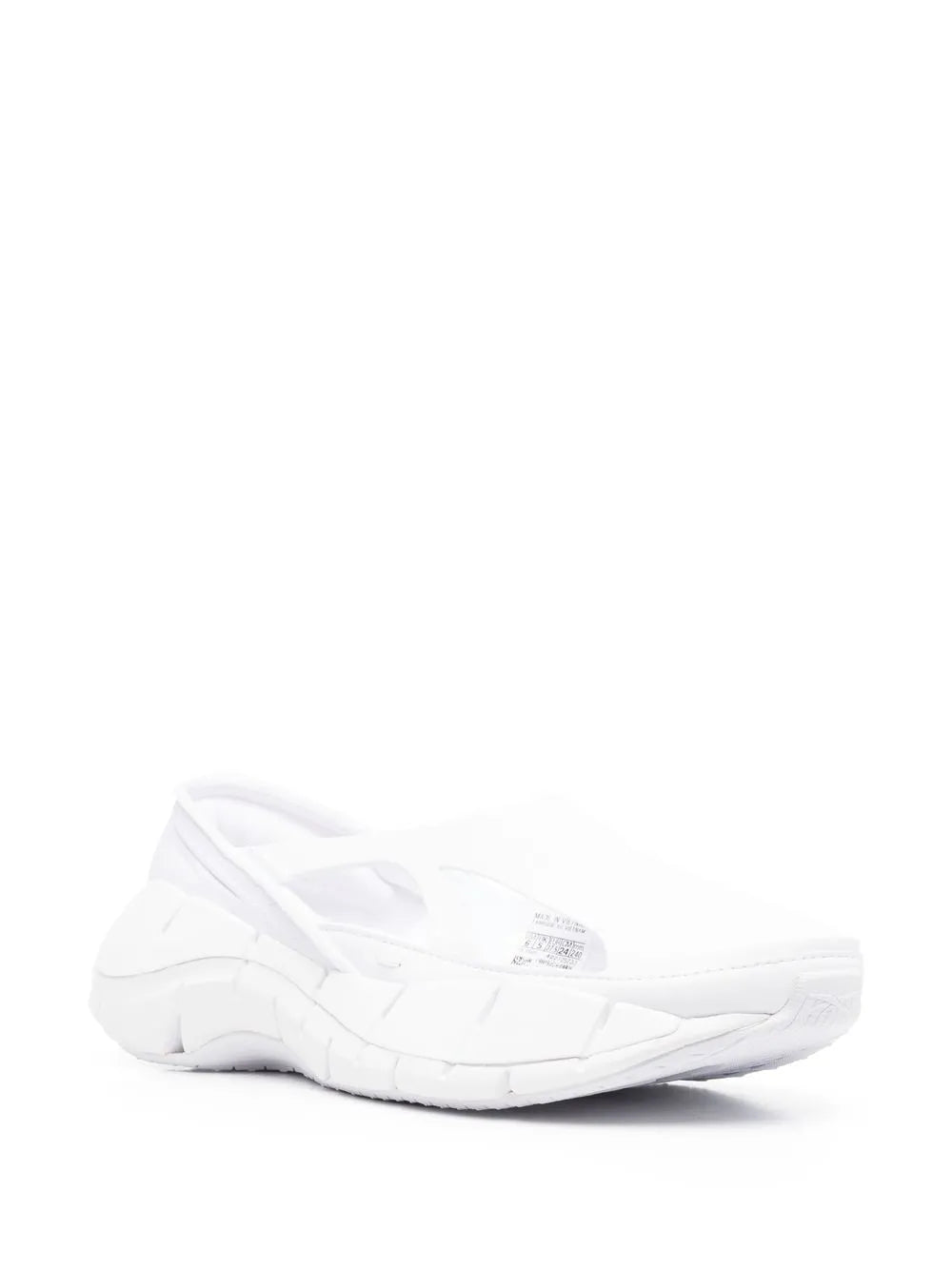 White Maison Margiela sneakers, side view, cut-out ridged upper and chunky sole