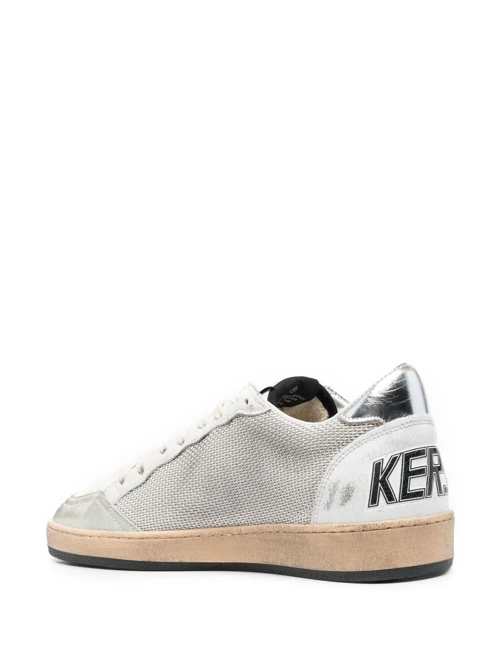 Low-top sneakers with 'KER' heel lettering, light gray upper, tan rubber sole