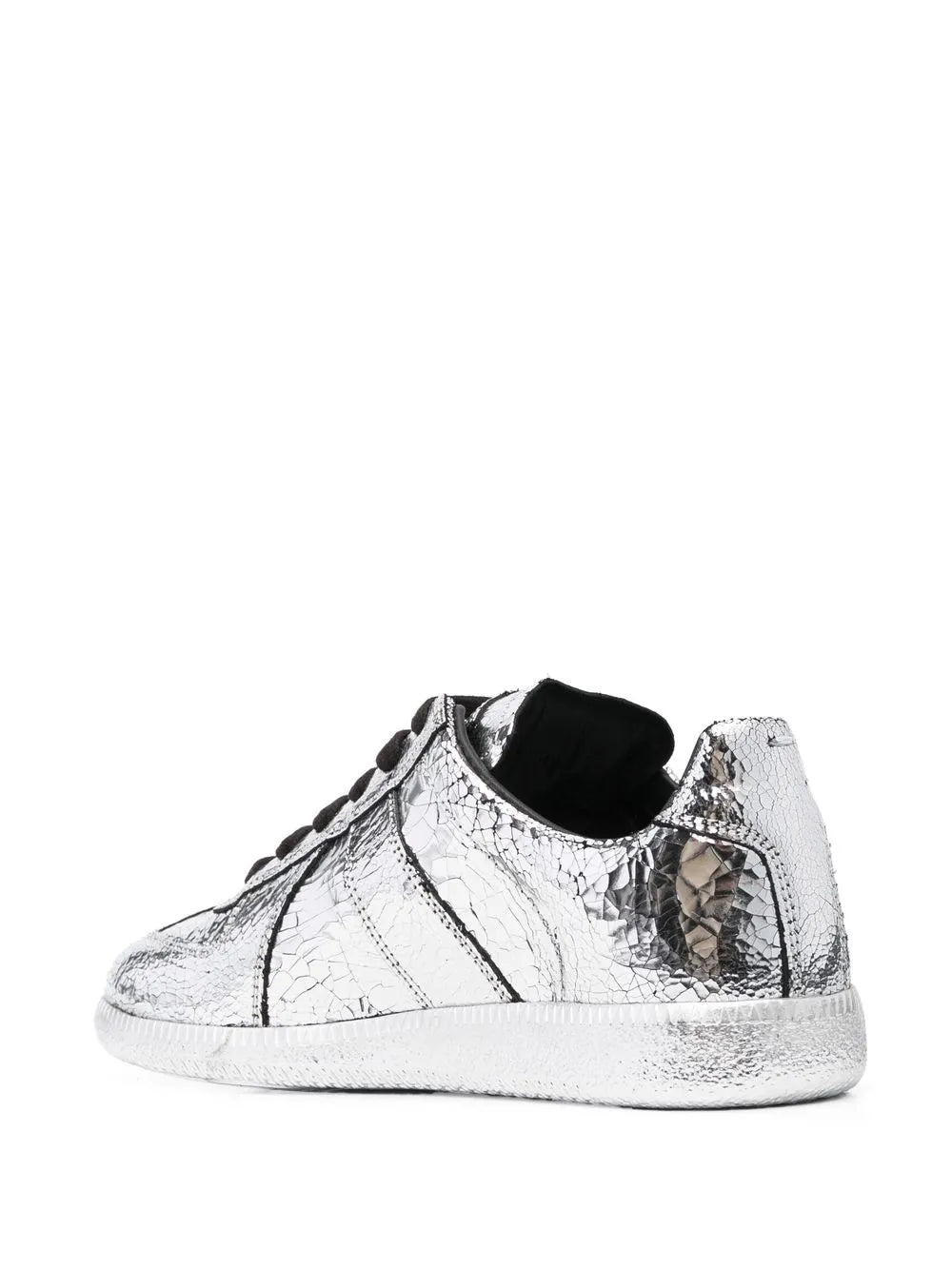 Silver metallic low-top sneaker with black padded collar lining