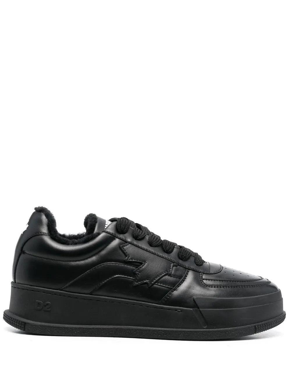 Black chunky low-top lace-up sneakers with stitched panel and side slash detail