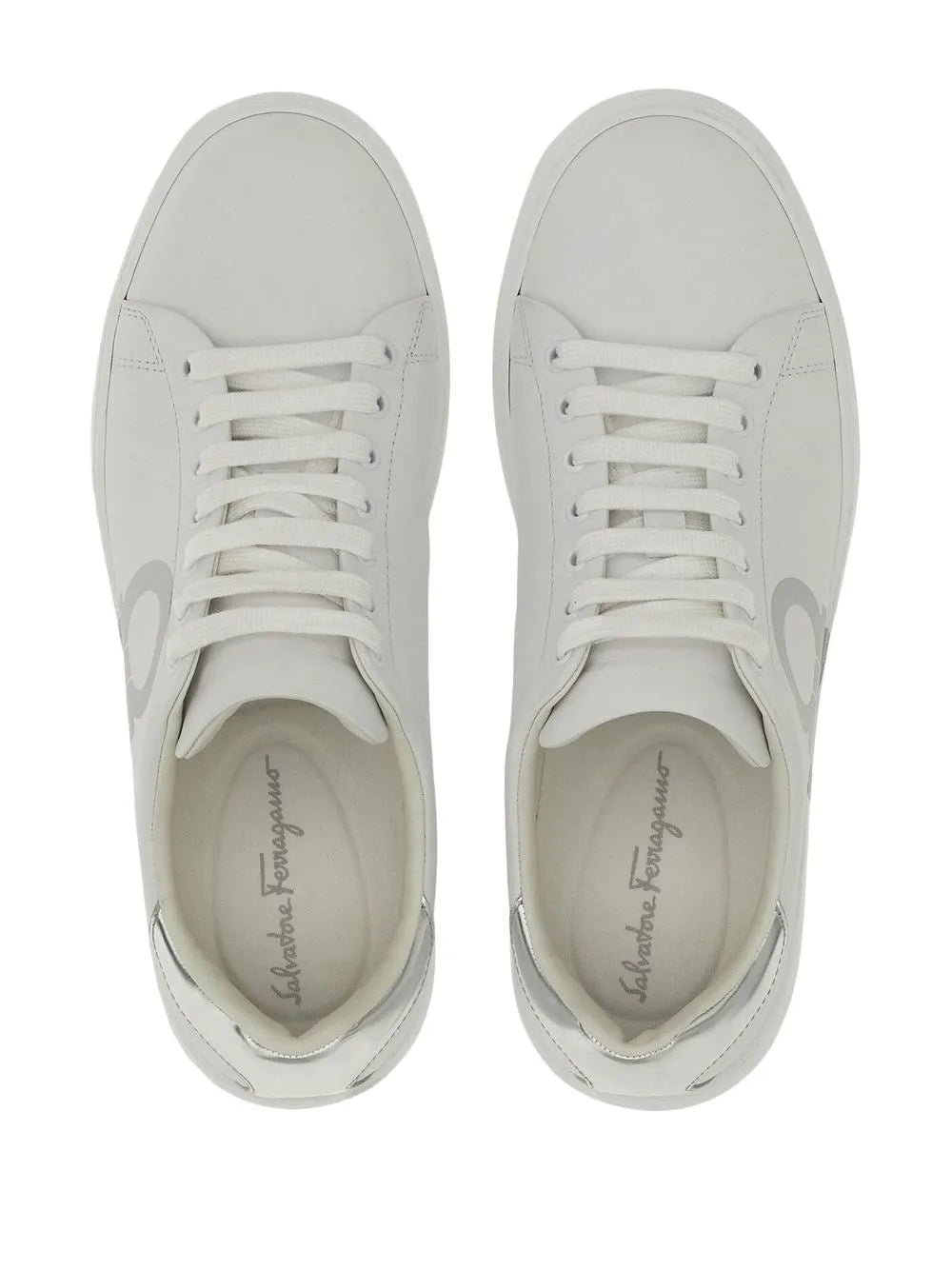 Ferragamo Gancini-print lace-up sneakers, white front view with laces and toe cap