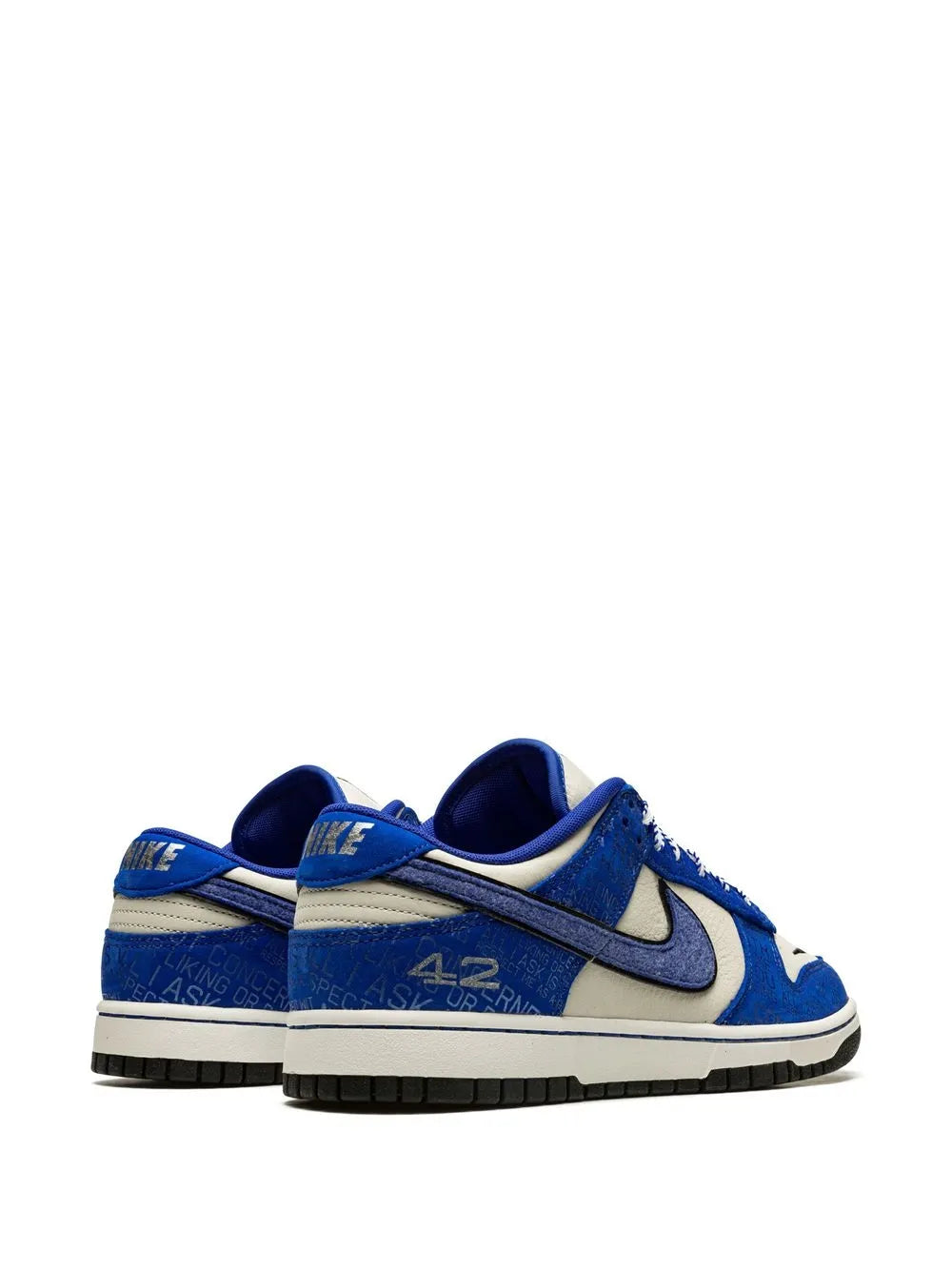 Blue and white low-top sneakers, side view pair with Nike swoosh