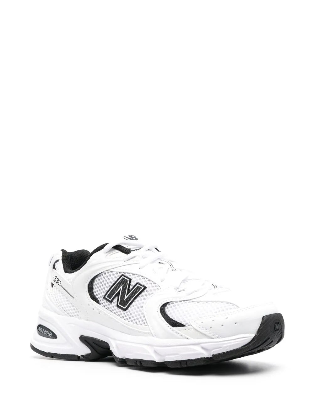 White low-top sneakers with large N logo and black accents, lace-up