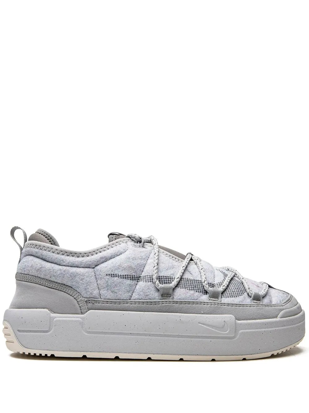 Grey lace-up sneaker with thick midsole and stitched overlays