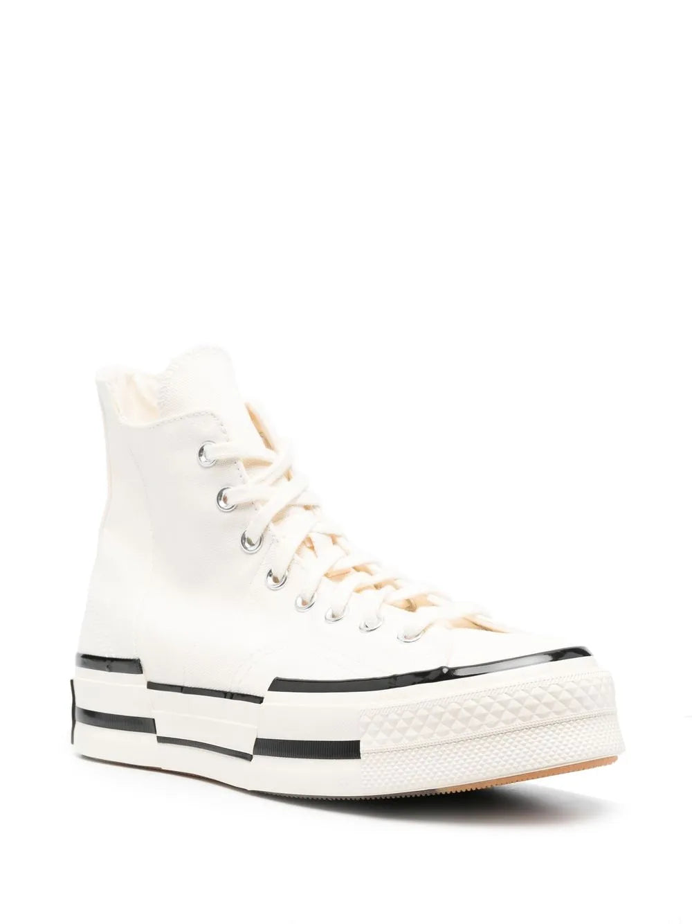 White Converse high-top sneakers with black side stripes and lace-up front.