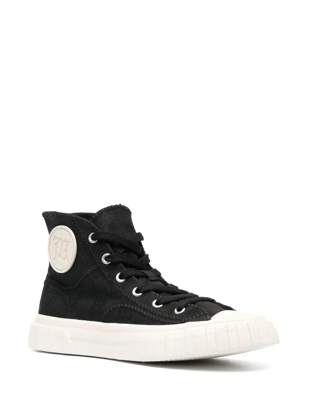 Black high-top sneaker with round logo patch, lace-up eyelets, and white sole