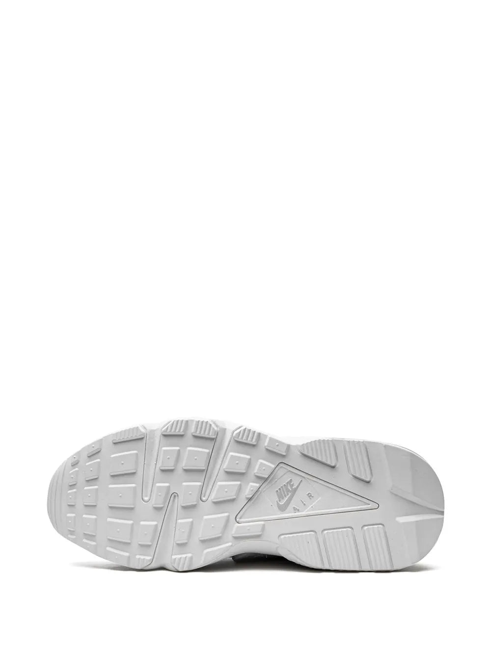 White Nike Air Huarache outsole with tread pattern and logo on forefoot