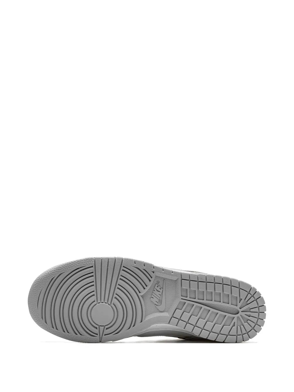 Low-top sneaker outsole with gray rubber tread and Nike logo.