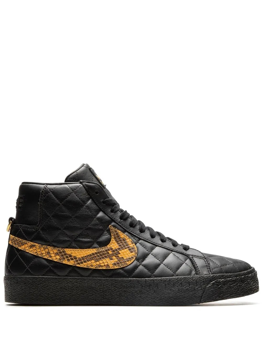 Black quilted high-top sneakers with yellow-orange Nike swoosh and lace-up closure