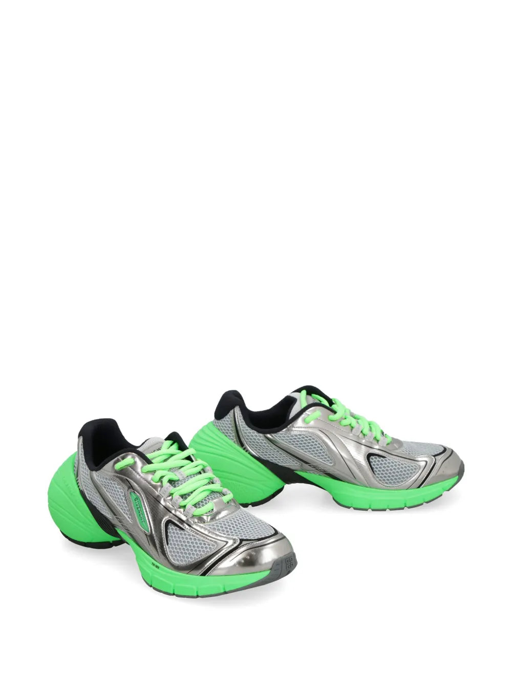Neon green and silver low-top sneakers, black trim, two-tone laces and chunky sole