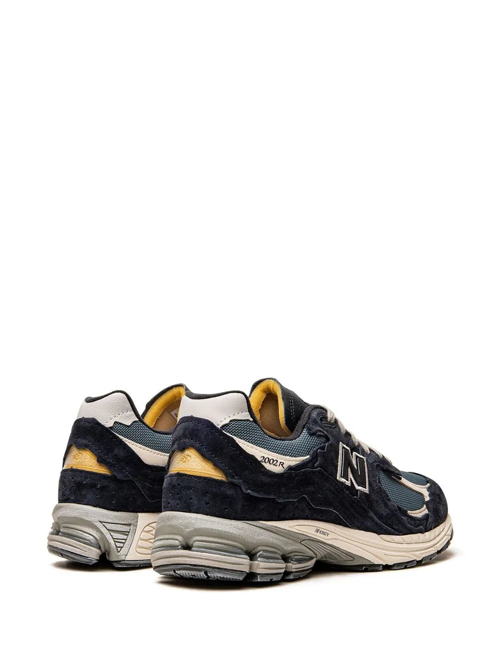 New Balance 2002R sneakers, dark navy with heel tab and cream/yellow accents
