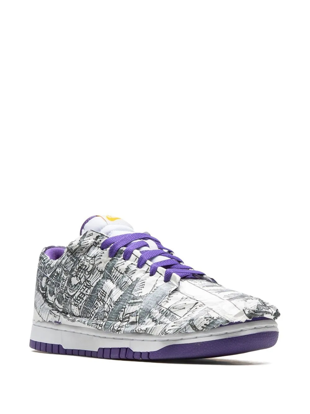 Low-top sneakers with black-and-white artwork, purple laces, purple midsole