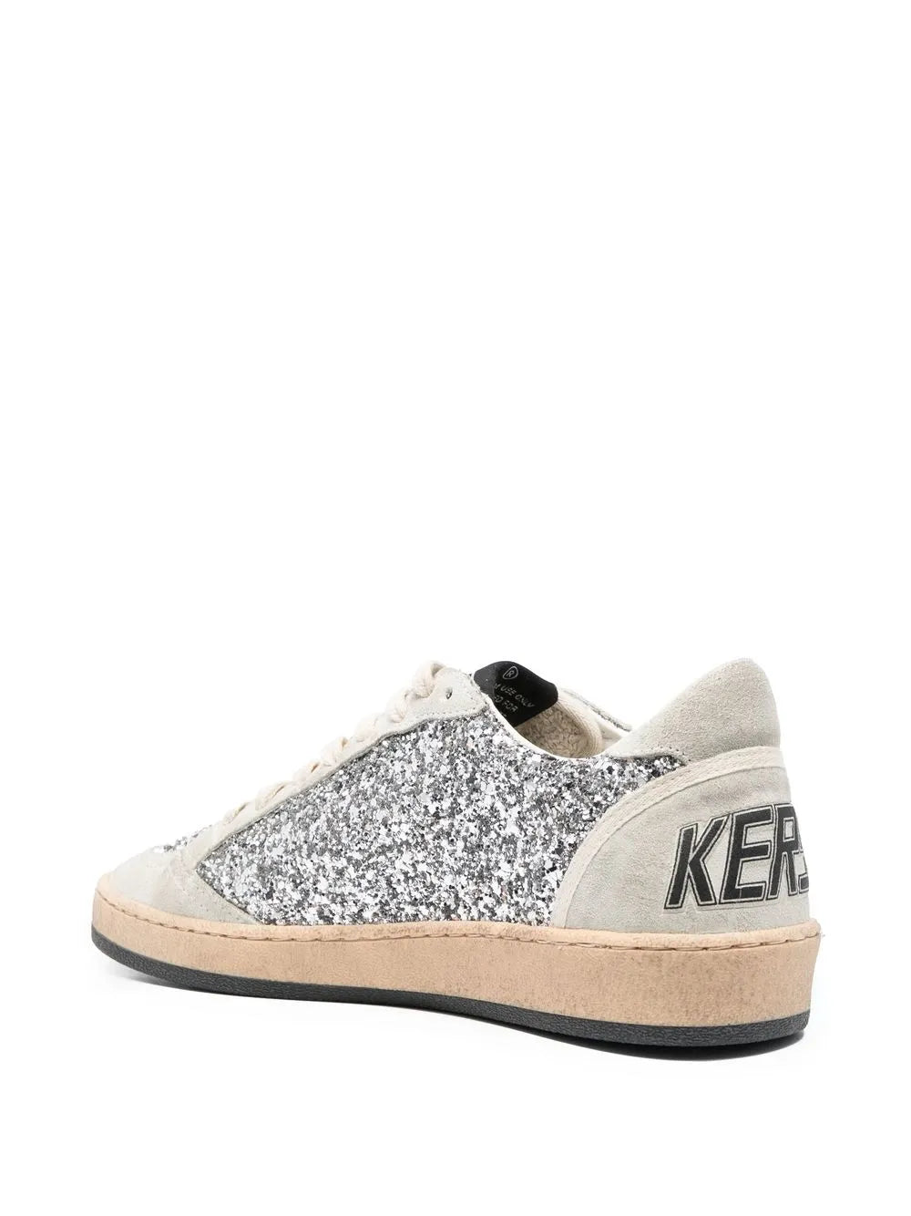 Back view of silver glitter low-top sneakers with heel logo and beige sole