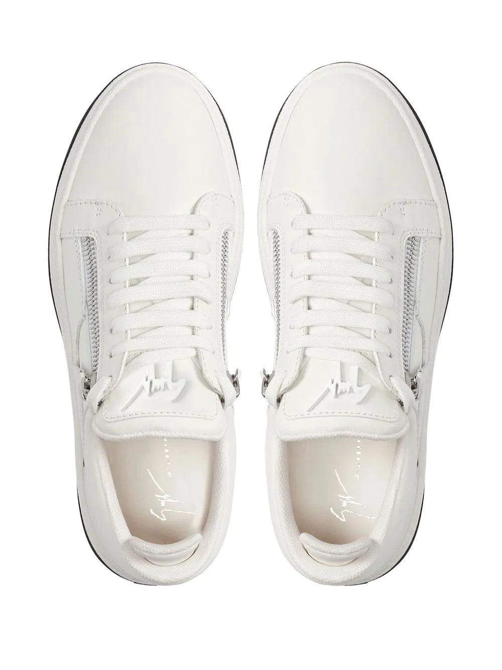 White low-top sneakers top view with white laces and side stitching detail